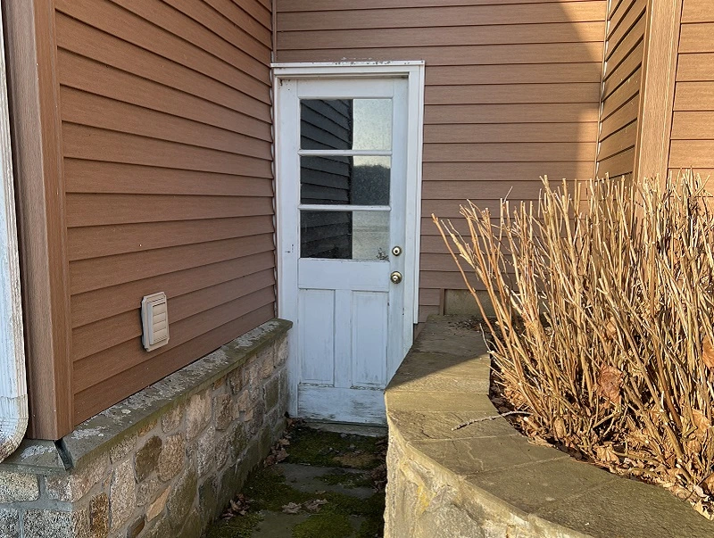 Wooden basement door to be replaced